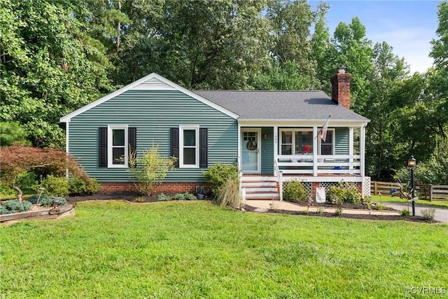 7085 Foxlair Dr, Mechanicsville, VA 23111 - view of front of home with covered porch, a chimney, a front lawn, and roof with shingles