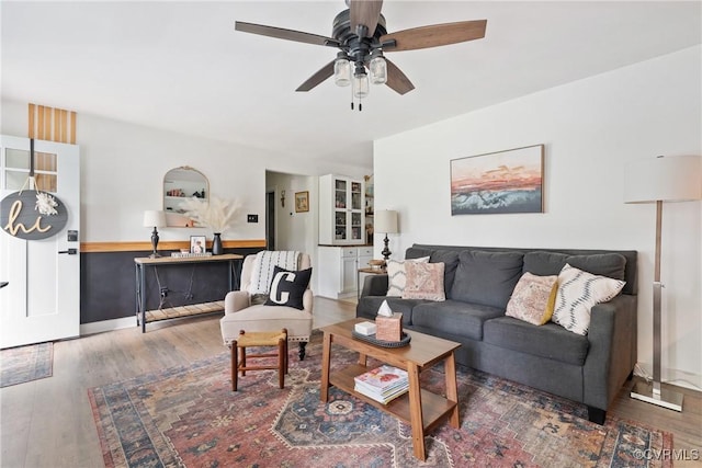 7085 Foxlair Dr, Mechanicsville, VA 23111 - living area with a ceiling fan and wood finished floors