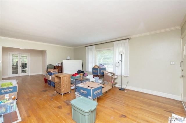 1939 Cumberland Ave, Petersburg, VA 23805 - living area with light wood-style flooring, ornamental molding, plenty of natural light, and french doors
