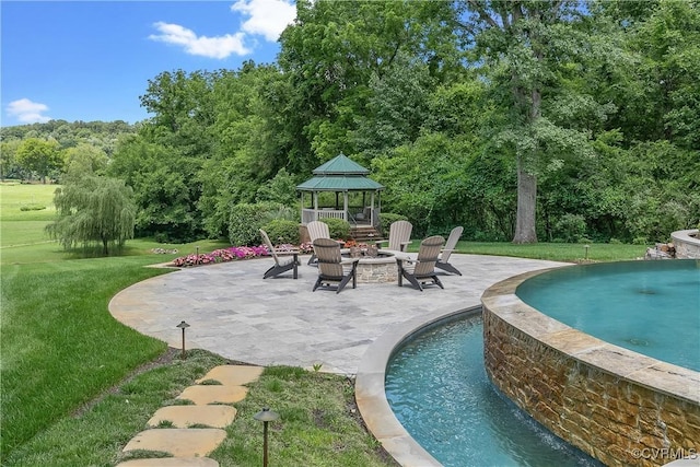 3300 Riverglade Rd, Powhatan, VA 23139 - view of pool with a gazebo, an outdoor fire pit, a patio area, a yard, and an infinity pool