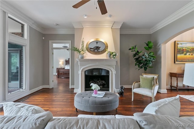 3300 Riverglade Rd, Powhatan, VA 23139 - living room featuring a ceiling fan, a fireplace, wood finished floors, and crown molding