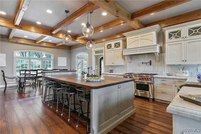 3300 Riverglade Rd, Powhatan, VA 23139 - kitchen featuring designer range, butcher block countertops, premium range hood, beam ceiling, and dark wood-style flooring