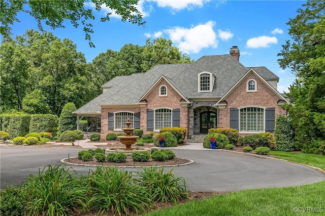 3300 Riverglade Rd, Powhatan, VA 23139 - view of front of property with brick siding and a chimney