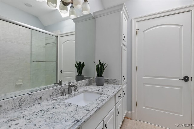 3300 Riverglade Rd, Powhatan, VA 23139 - bathroom featuring vanity, tiled shower, tile patterned flooring, and lofted ceiling