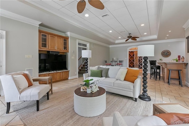 3300 Riverglade Rd, Powhatan, VA 23139 - living area with a ceiling fan, a raised ceiling, light tile patterned floors, crown molding, and recessed lighting