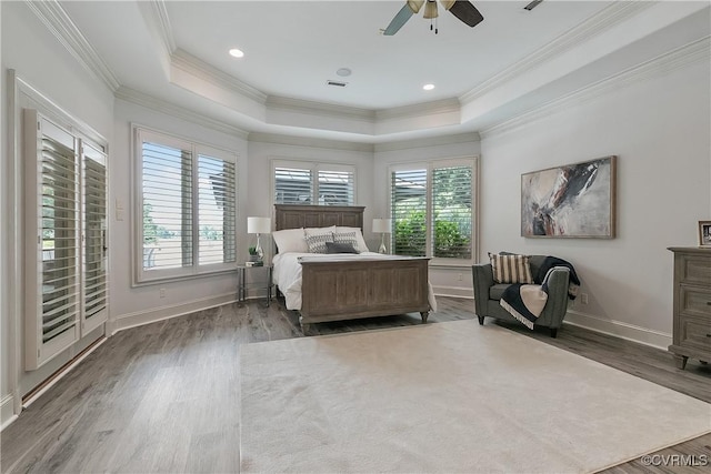 3300 Riverglade Rd, Powhatan, VA 23139 - bedroom with wood finished floors, a tray ceiling, ornamental molding, and ceiling fan