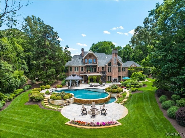 3300 Riverglade Rd, Powhatan, VA 23139 - back of property featuring a gazebo, a patio area, a lawn, and an outdoor pool