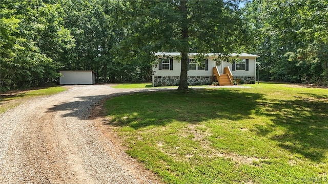 209 Oak Hill Rd, Prospect, VA 23960 - view of front facade with a front lawn, gravel driveway, and an outdoor structure