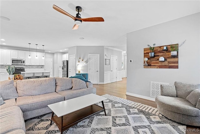 9032 Fascine Ct, Mechanicsville, VA 23116 - living room with ceiling fan, light wood-style floors, and recessed lighting