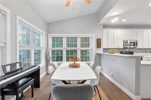 9032 Fascine Ct, Mechanicsville, VA 23116 - dining room featuring vaulted ceiling, plenty of natural light, wood finished floors, ceiling fan, and recessed lighting