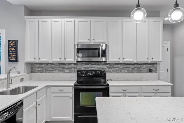 9032 Fascine Ct, Mechanicsville, VA 23116 - kitchen featuring black appliances, white cabinetry, and tasteful backsplash