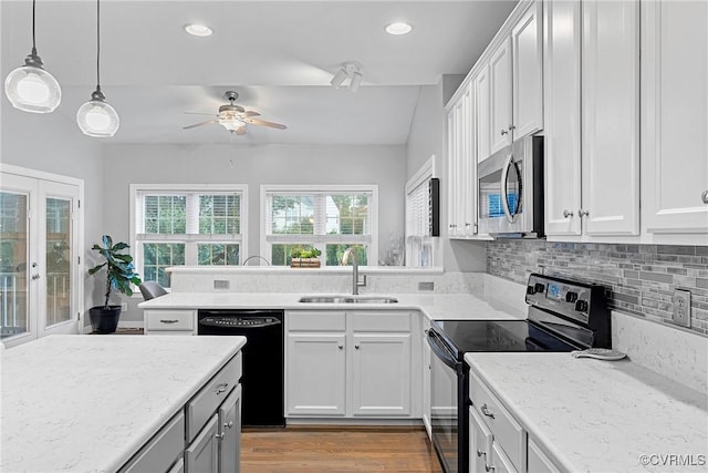9032 Fascine Ct, Mechanicsville, VA 23116 - kitchen with black appliances, ceiling fan, recessed lighting, white cabinetry, and backsplash