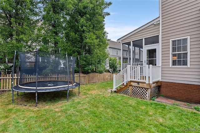 9032 Fascine Ct, Mechanicsville, VA 23116 - view of yard featuring a trampoline and a sunroom