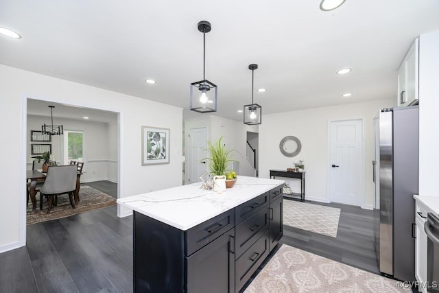 2629 Maidens Rd, Powhatan, VA 23139 - kitchen featuring freestanding refrigerator, dark wood finished floors, a kitchen island, recessed lighting, and white cabinetry