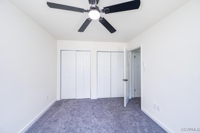 2629 Maidens Rd, Powhatan, VA 23139 - unfurnished bedroom featuring multiple closets, carpet floors, and ceiling fan
