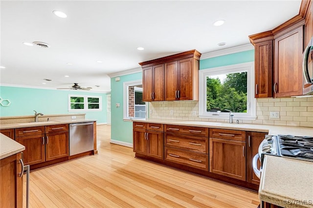 3 Milby Cir, Sandston, VA 23150 - kitchen with dishwasher, crown molding, light countertops, backsplash, and recessed lighting