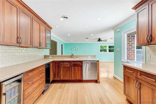 3 Milby Cir, Sandston, VA 23150 - kitchen with wine cooler, stainless steel dishwasher, light wood-style flooring, a peninsula, and a ceiling fan