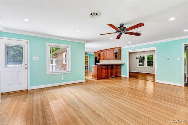 3 Milby Cir, Sandston, VA 23150 - unfurnished living room with plenty of natural light, crown molding, recessed lighting, light wood-style floors, and a ceiling fan