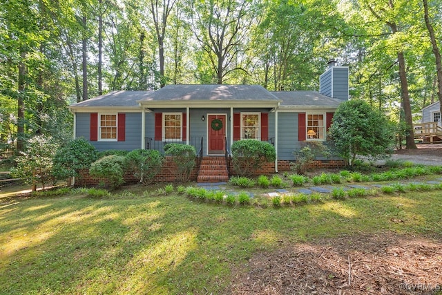 2713 Brookforest Rd, Midlothian, VA 23112 - ranch-style house with a chimney, a front yard, and roof with shingles