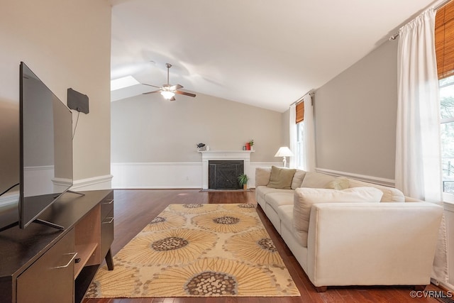 2713 Brookforest Rd, Midlothian, VA 23112 - living area featuring ceiling fan, dark wood-style flooring, a fireplace, healthy amount of natural light, and vaulted ceiling