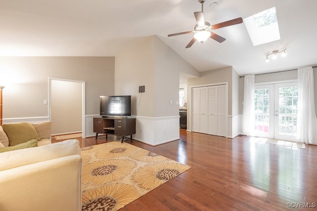 2713 Brookforest Rd, Midlothian, VA 23112 - living area with wainscoting, ceiling fan, a skylight, vaulted ceiling, and wood finished floors