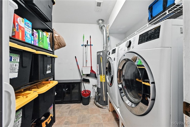 16731 Amherst Oak Ln, Chesterfield, VA 23834 - washroom with washing machine and clothes dryer and gas water heater