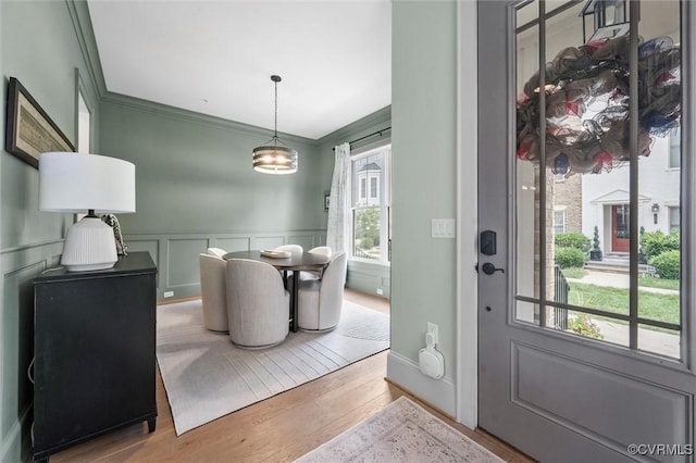 12340 Purbrook Walk, Henrico, VA 23233 - entryway featuring ornamental molding, wood finished floors, a wainscoted wall, and a decorative wall