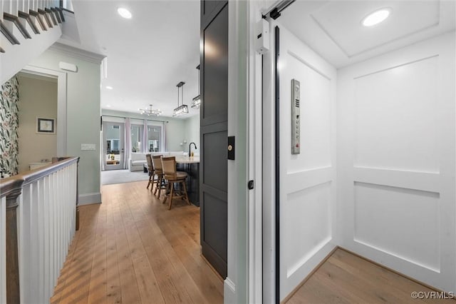 12340 Purbrook Walk, Henrico, VA 23233 - corridor with light wood-style flooring, elevator, and recessed lighting