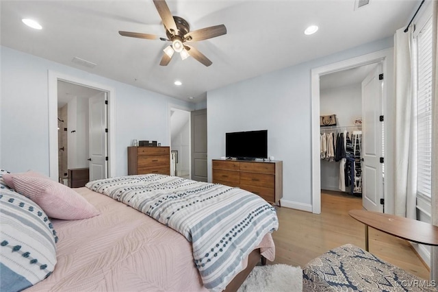12340 Purbrook Walk, Henrico, VA 23233 - bedroom with light wood finished floors, a walk in closet, recessed lighting, a closet, and ceiling fan