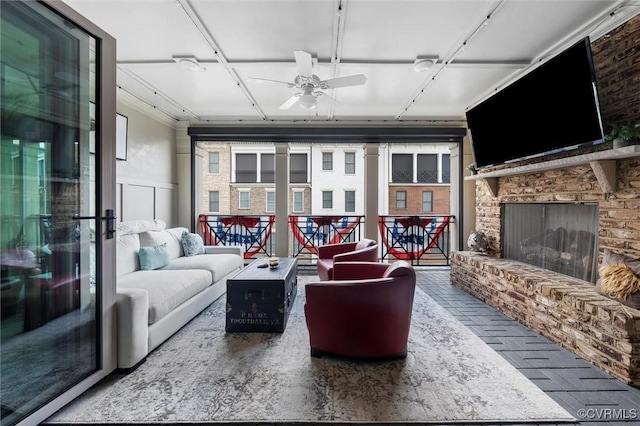 12340 Purbrook Walk, Henrico, VA 23233 - living room featuring a ceiling fan and a brick fireplace