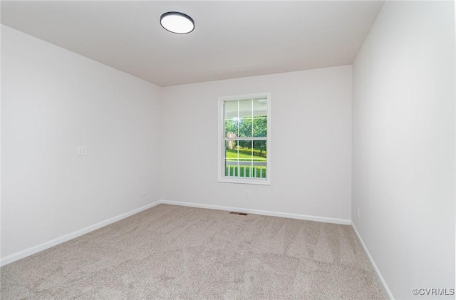 24 Hummingbird Ln, Cumberland, VA 23040 - carpeted empty room with baseboards