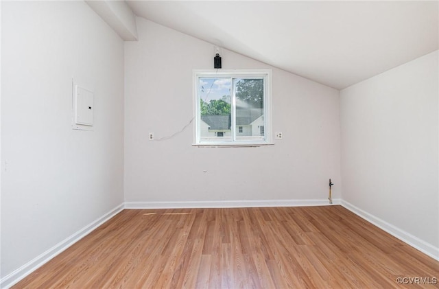 24 Hummingbird Ln, Cumberland, VA 23040 - unfurnished room with vaulted ceiling and light wood-style floors