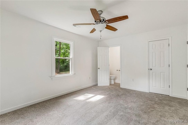 3721 Belle Meade Rd, Bumpass, VA 23024 - unfurnished bedroom featuring carpet floors, ensuite bathroom, and a ceiling fan
