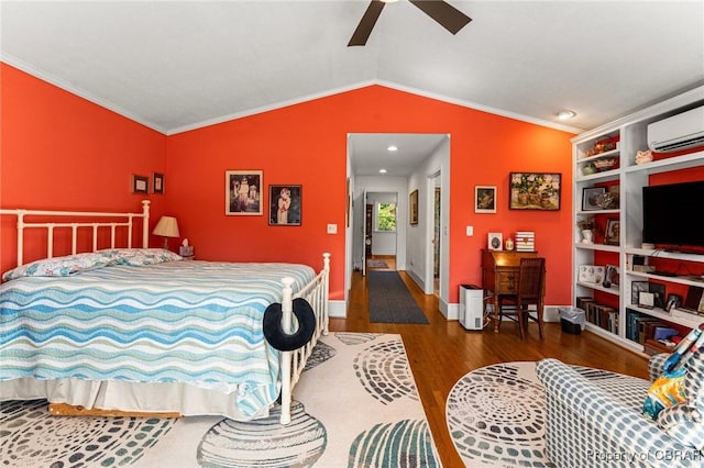 77 Kent Cove Rd, Kilmarnock, VA 22482 - bedroom featuring wood finished floors, a wall unit AC, vaulted ceiling, a ceiling fan, and crown molding