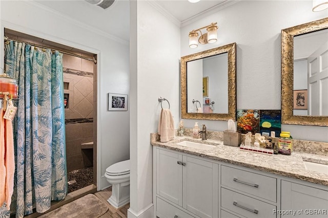 77 Kent Cove Rd, Kilmarnock, VA 22482 - bathroom featuring double vanity, a tile shower, crown molding, and wood finished floors