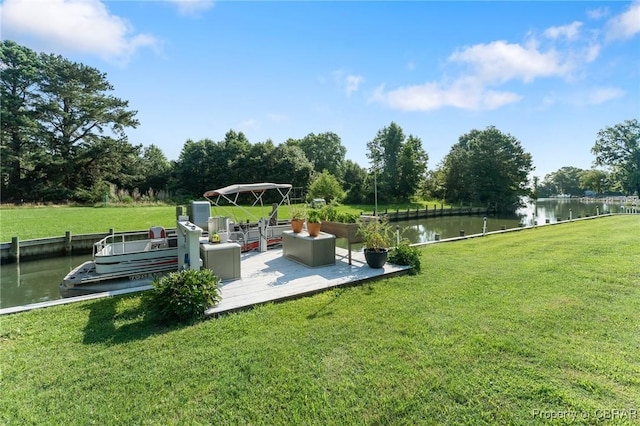 77 Kent Cove Rd, Kilmarnock, VA 22482 - surrounding community featuring a water view, a lawn, view of scattered trees, and a dock