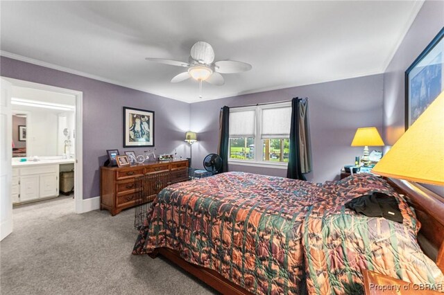 77 Kent Cove Rd, Kilmarnock, VA 22482 - bedroom featuring carpet floors, crown molding, connected bathroom, and a ceiling fan