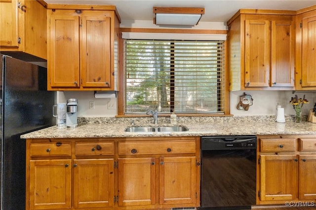 13030 River Hills Dr, Midlothian, VA 23113 - kitchen with black appliances, light stone counters, and brown cabinetry