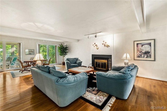 13030 River Hills Dr, Midlothian, VA 23113 - living area with beam ceiling, wood finished floors, and a fireplace with flush hearth