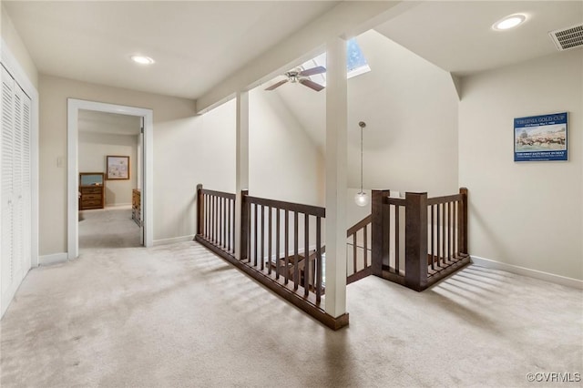 13030 River Hills Dr, Midlothian, VA 23113 - hallway featuring an upstairs landing, carpet flooring, vaulted ceiling, a skylight, and recessed lighting