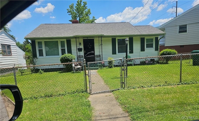 509 N Dunlop St, Petersburg, VA 23803 - view of front facade with a porch, a fenced front yard, a gate, a chimney, and roof with shingles