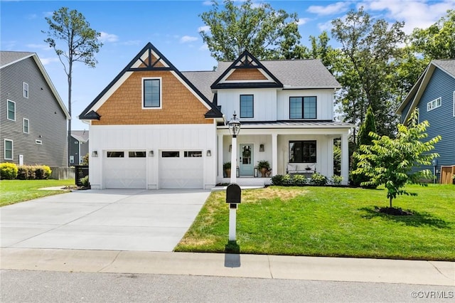 3719 Waverton Dr, Midlothian, VA 23112 - view of front of home featuring board and batten siding, concrete driveway, covered porch, a standing seam roof, and a front yard