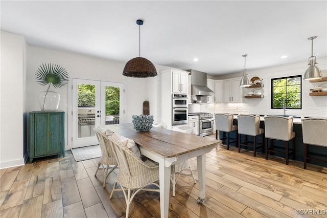 3719 Waverton Dr, Midlothian, VA 23112 - dining room featuring light wood-type flooring, recessed lighting, and french doors
