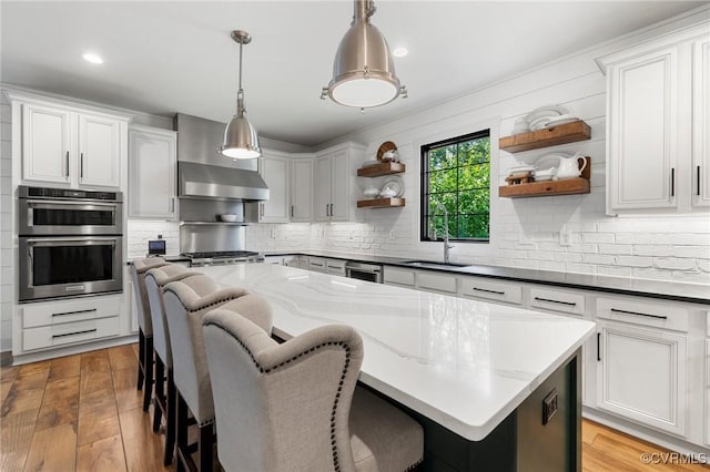 3719 Waverton Dr, Midlothian, VA 23112 - kitchen featuring open shelves, stainless steel double oven, decorative backsplash, a center island, and recessed lighting