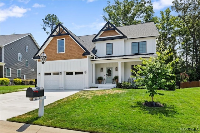 3719 Waverton Dr, Midlothian, VA 23112 - view of front of house with board and batten siding, driveway, a standing seam roof, a front yard, and a porch