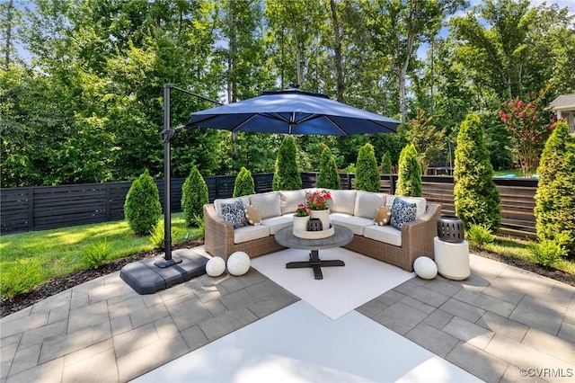 3719 Waverton Dr, Midlothian, VA 23112 - fenced backyard featuring an outdoor living space, a patio, and view of scattered trees