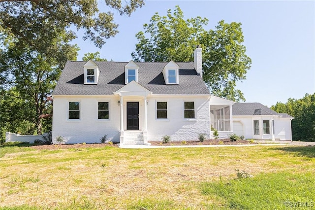 4700 New Kent, Quinton, VA 23141 - view of front of house with a chimney, a front yard, brick siding, and entry steps