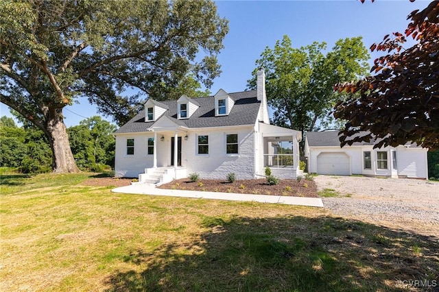 4700 New Kent, Quinton, VA 23141 - view of front facade featuring a garage, gravel driveway, a front yard, and a chimney