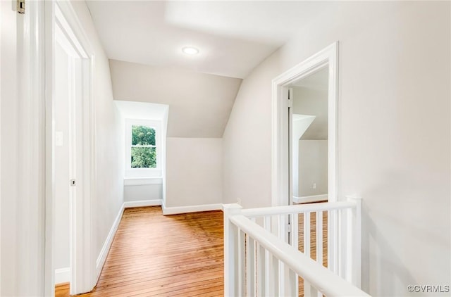 4700 New Kent, Quinton, VA 23141 - hallway with vaulted ceiling, light wood finished floors, and an upstairs landing
