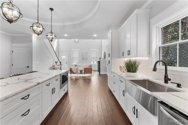 208 Minor St, Richmond, VA 23222 - kitchen featuring a chandelier, stainless steel appliances, white cabinetry, light stone counters, and recessed lighting